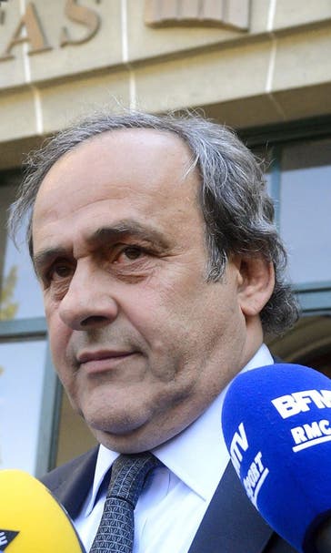 Platini to resign after ban from football reduced from six to four years